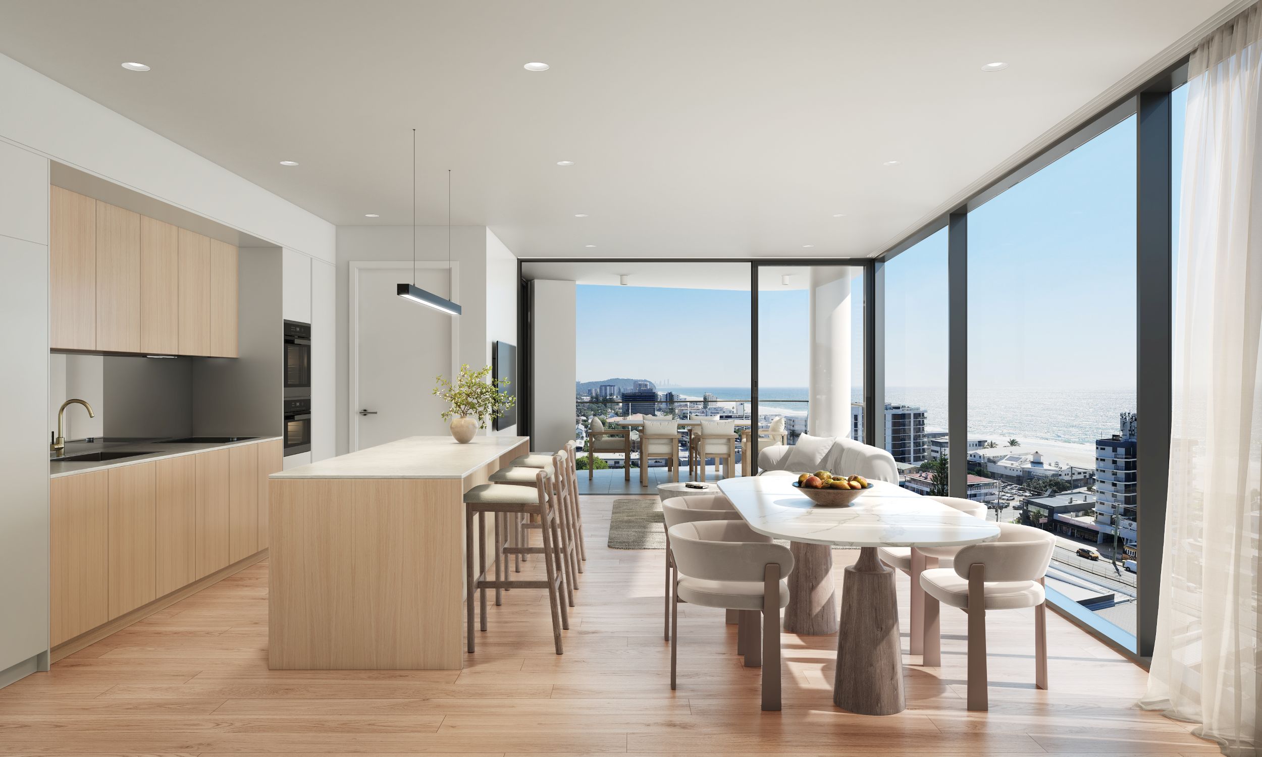 Amargo living, dining and kitchen with coastal views
